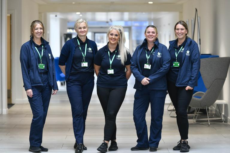 Group of carers standing in a row